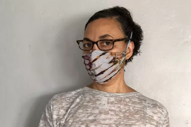 Photo of woman wearing mask