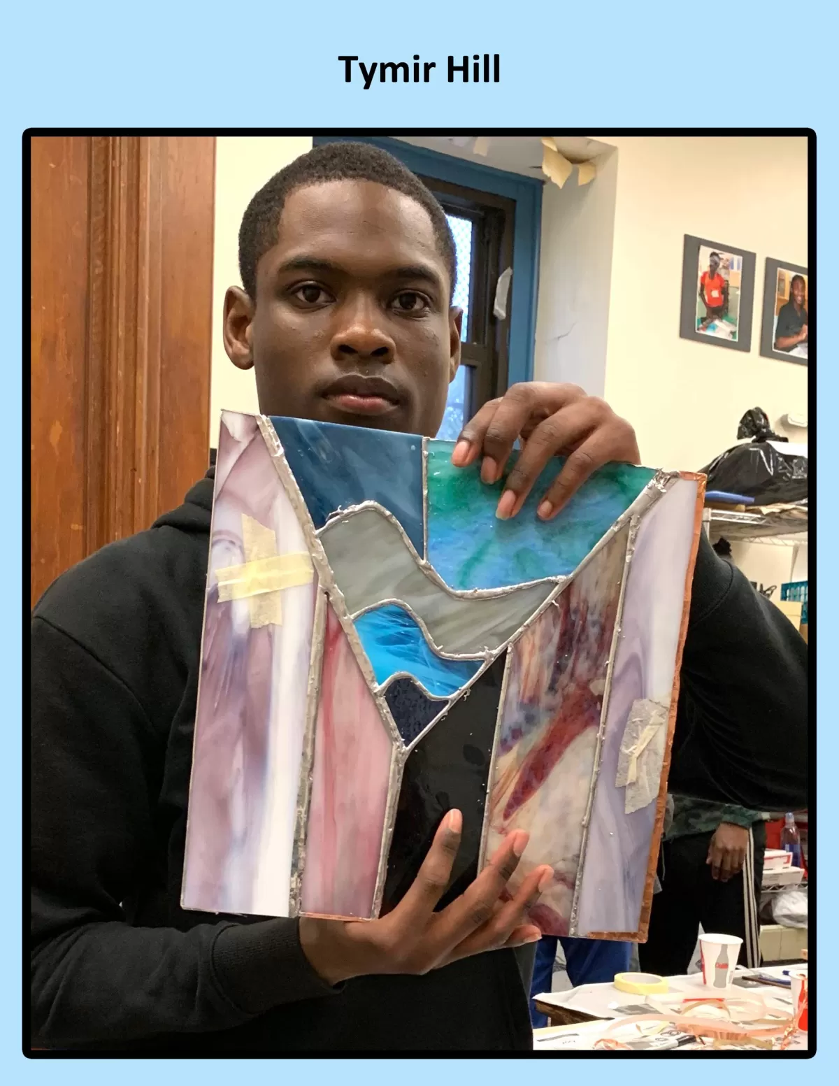 Tymir Hill with his project - Photo Credit: The Stained Glass Project