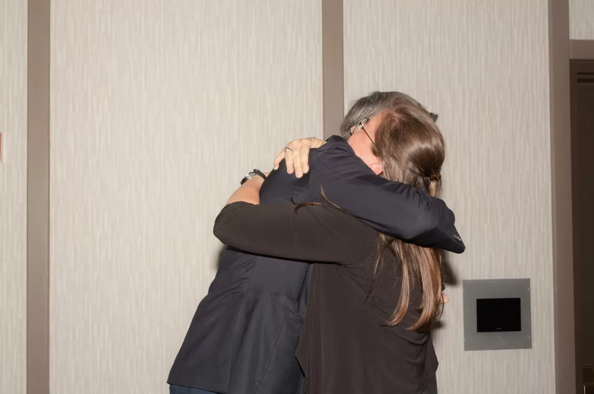 Megan McElfresh and David Judson hugging